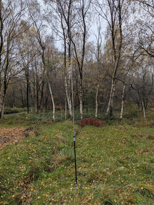 JPC-12 antenna in front of trees