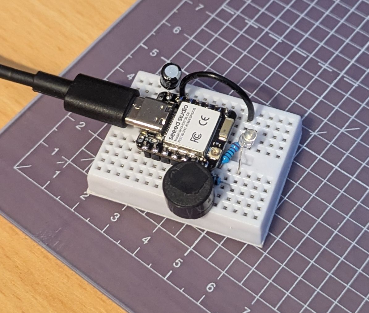 Picture of the Seeed Studio XIAO ESP32-C6 module and other components on a breadboard.